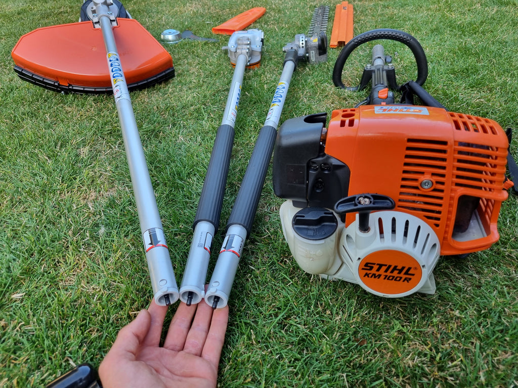 USED Stihl KM100R professional combi set. strimmer, long reach hedge cutter pole saw