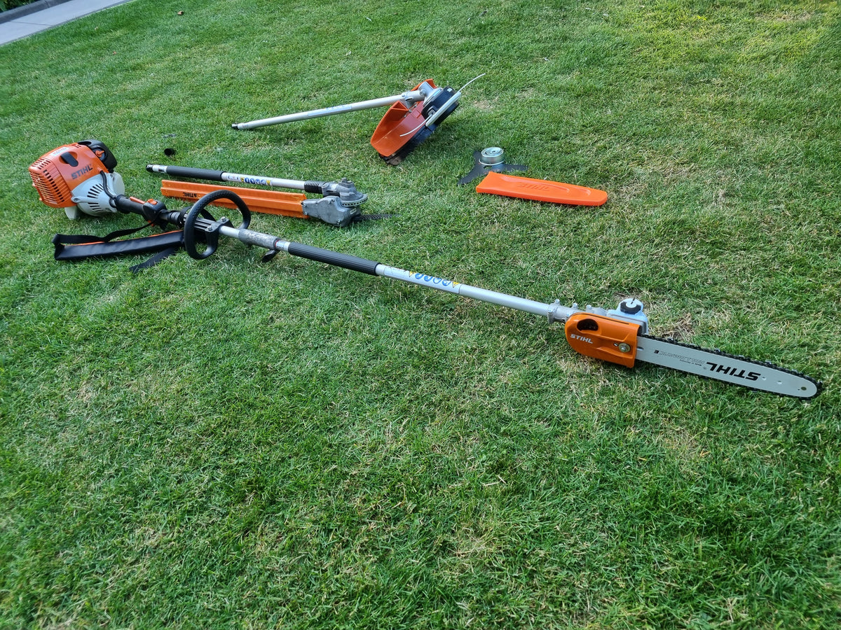 USED Stihl KM100R professional combi set. strimmer, long reach hedge cutter pole saw