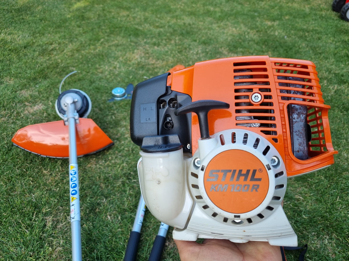 USED Stihl KM100R professional combi set. strimmer, long reach hedge cutter pole saw