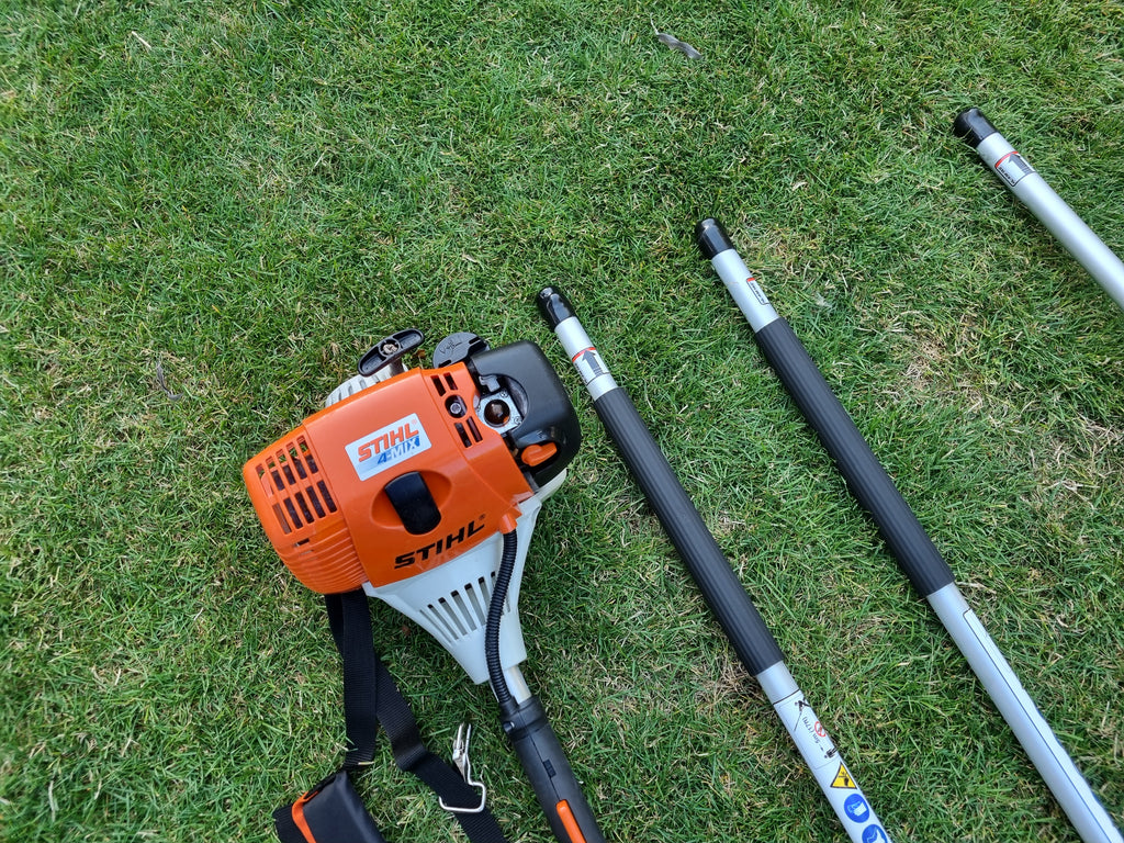 USED Stihl KM100R professional combi set. strimmer, long reach hedge cutter pole saw