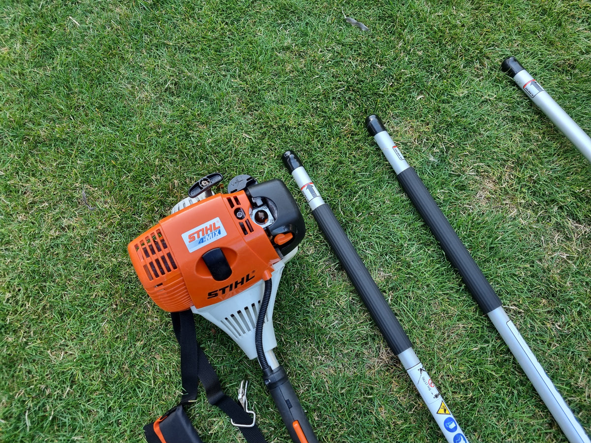 USED Stihl KM100R professional combi set. strimmer, long reach hedge cutter pole saw