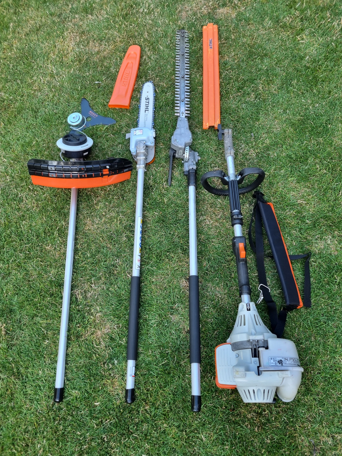 USED Stihl KM100R professional combi set. strimmer, long reach hedge cutter pole saw