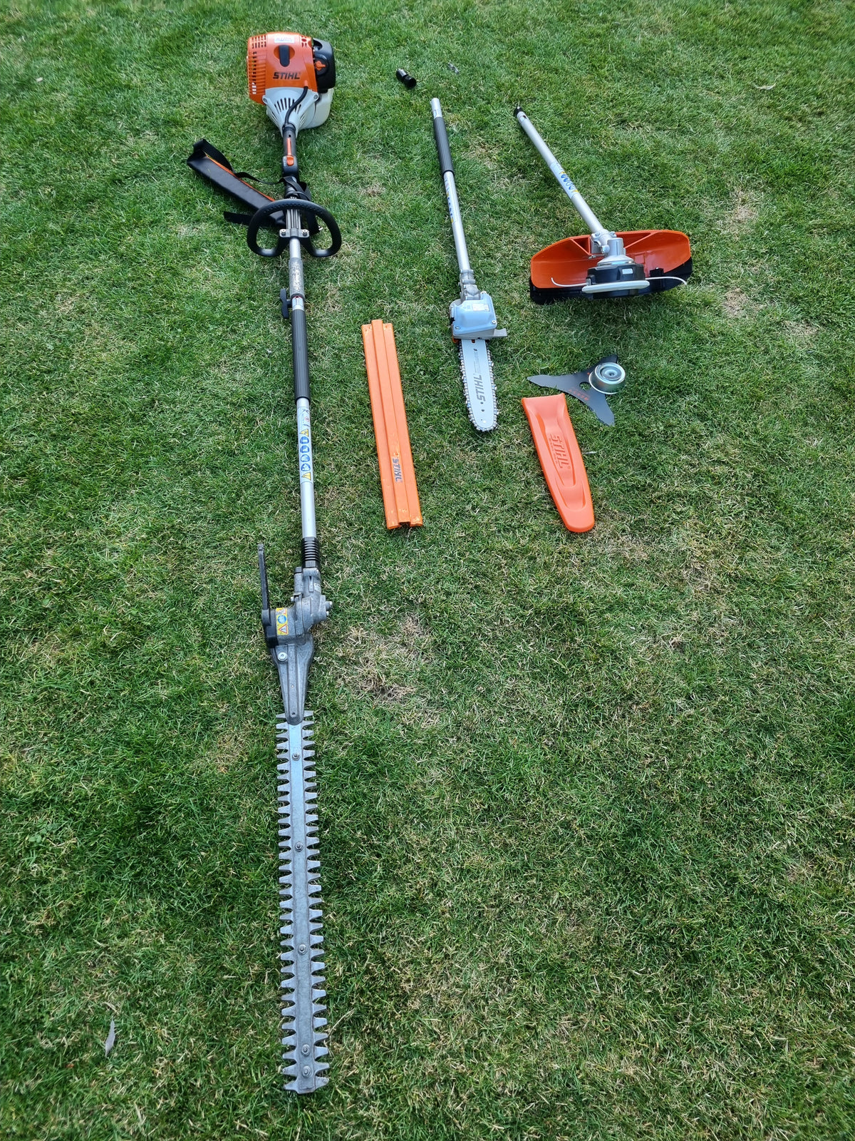 USED Stihl KM100R professional combi set. strimmer, long reach hedge cutter pole saw