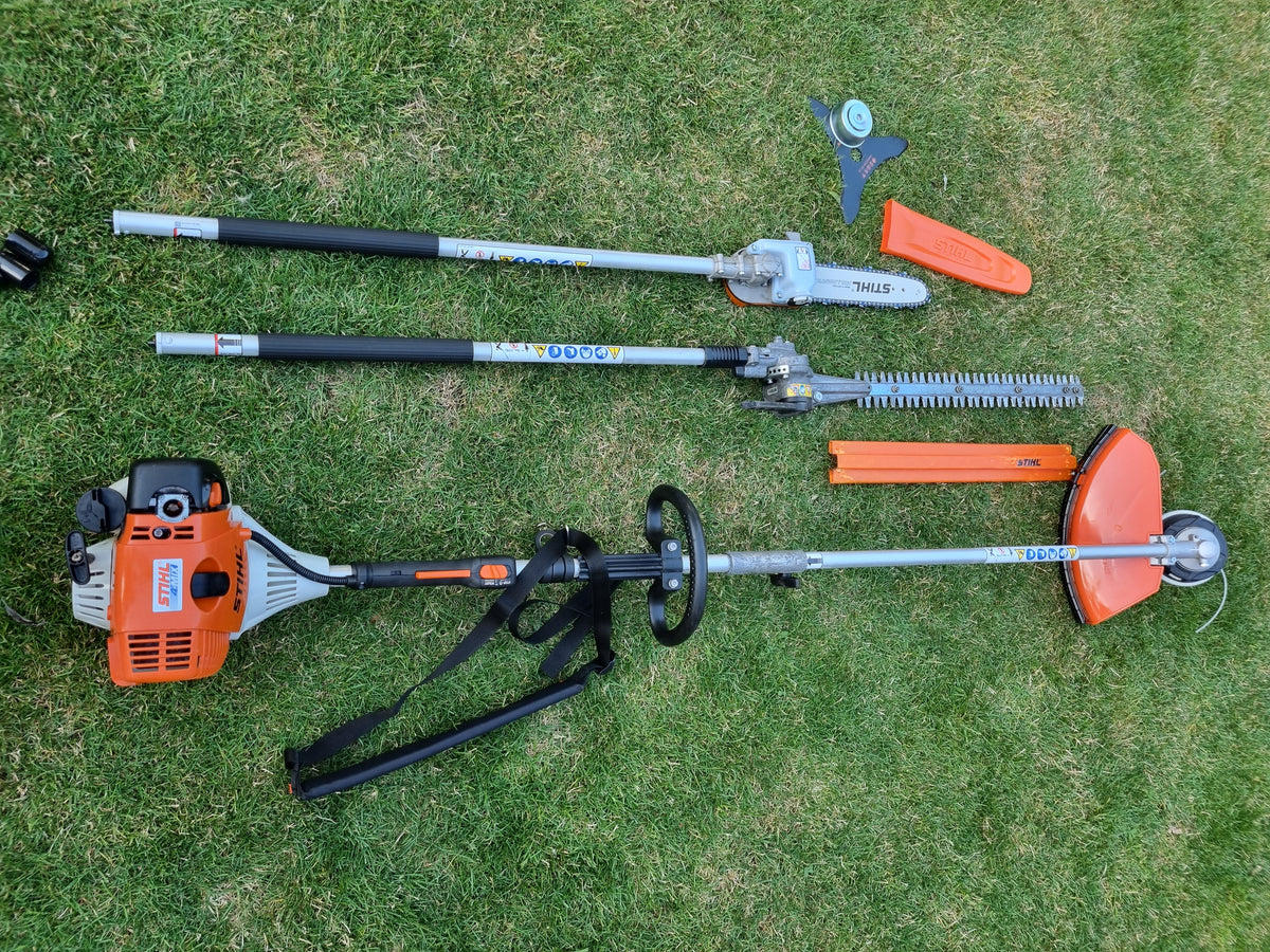 USED Stihl KM100R professional combi set. strimmer, long reach hedge cutter pole saw