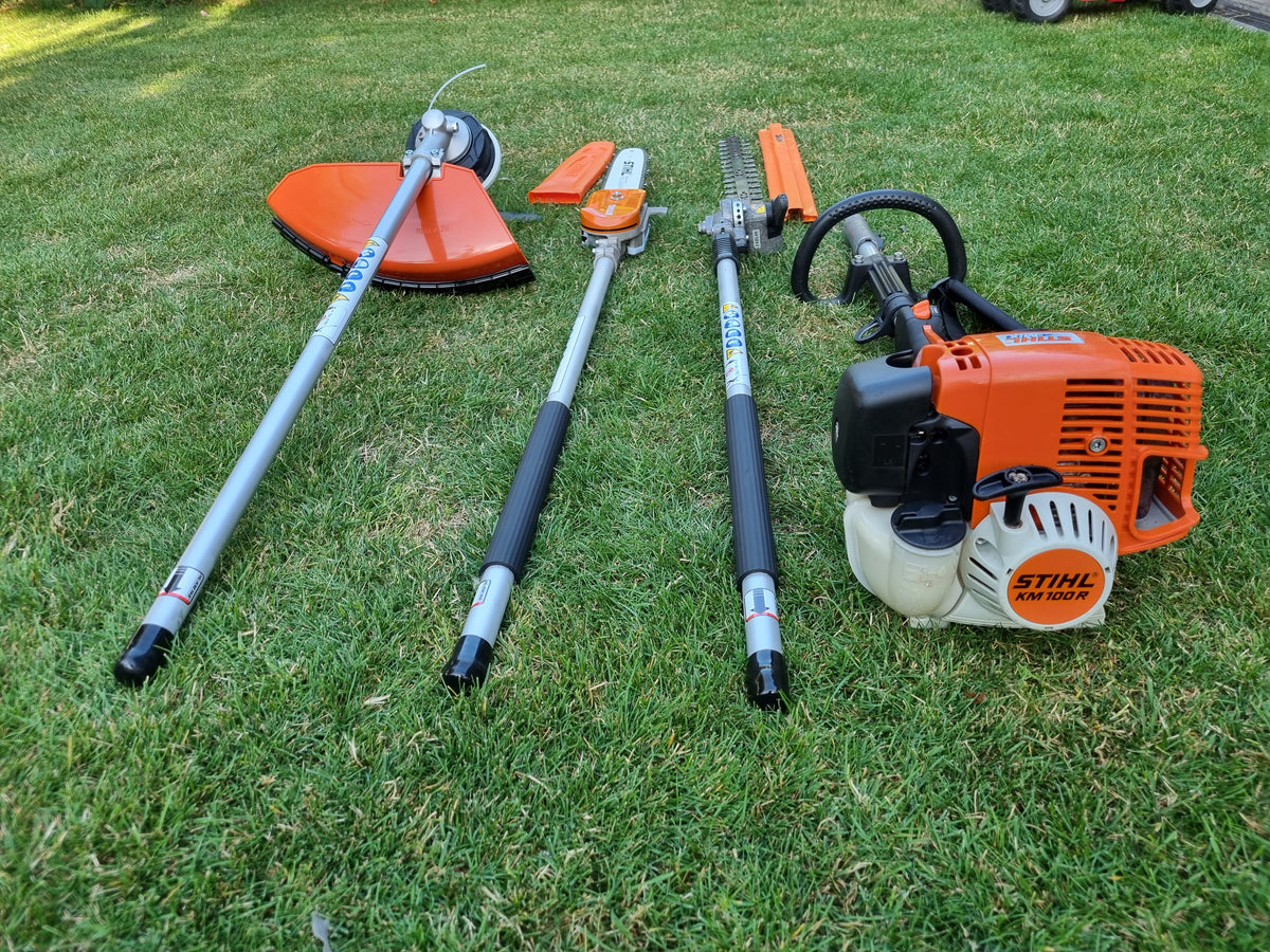 USED Stihl KM100R professional combi set. strimmer, long reach hedge cutter pole saw