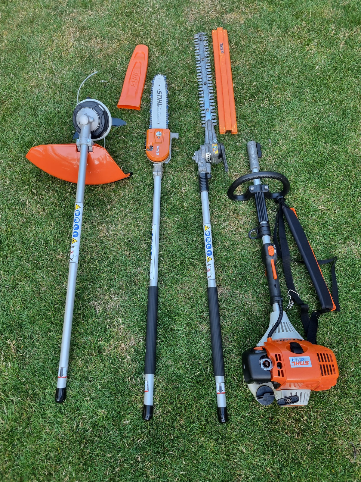 USED Stihl KM100R professional combi set. strimmer, long reach hedge cutter pole saw
